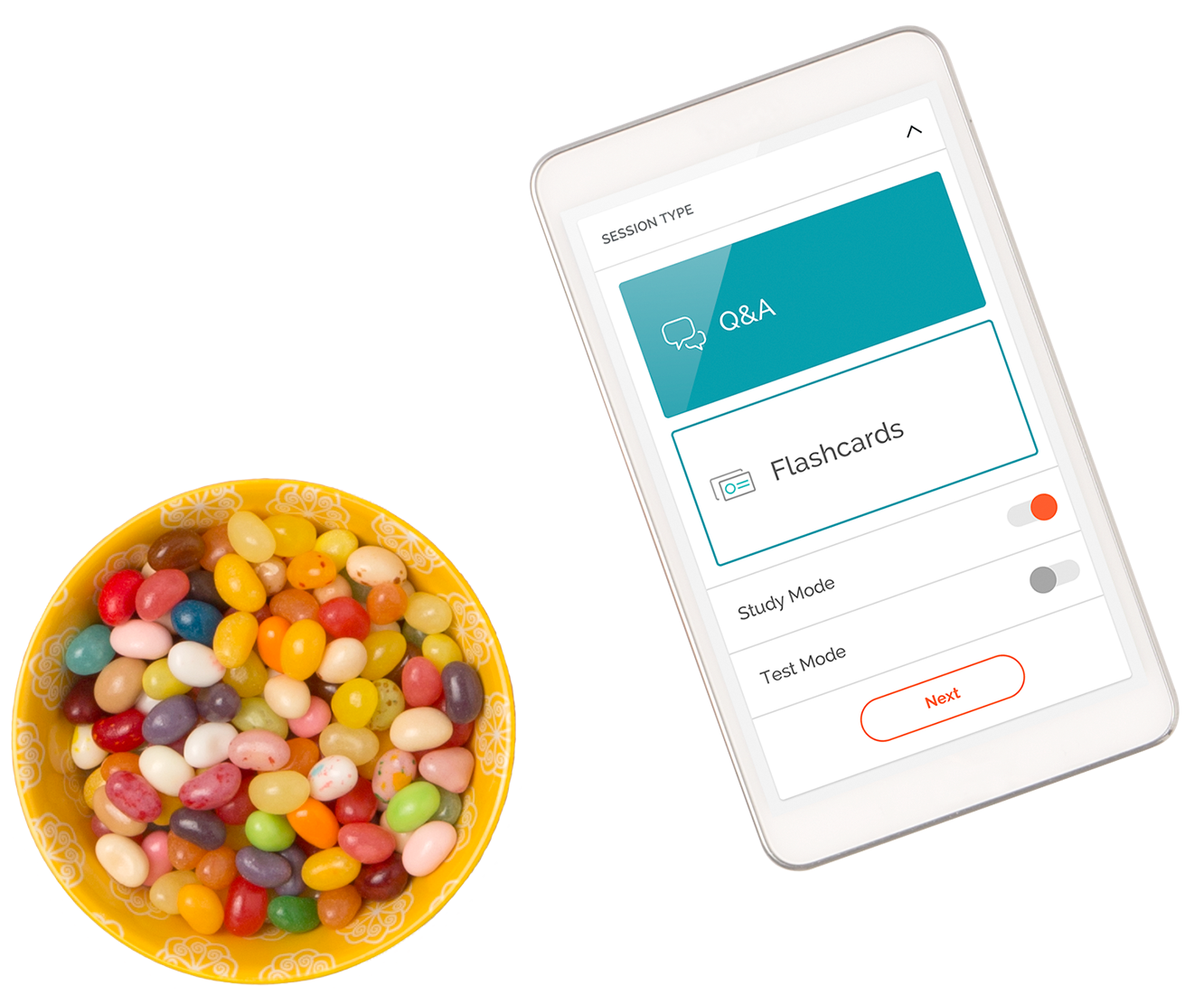 A bowl candy next to phone